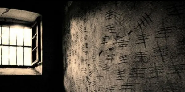 Cell window with tally marks on the wall